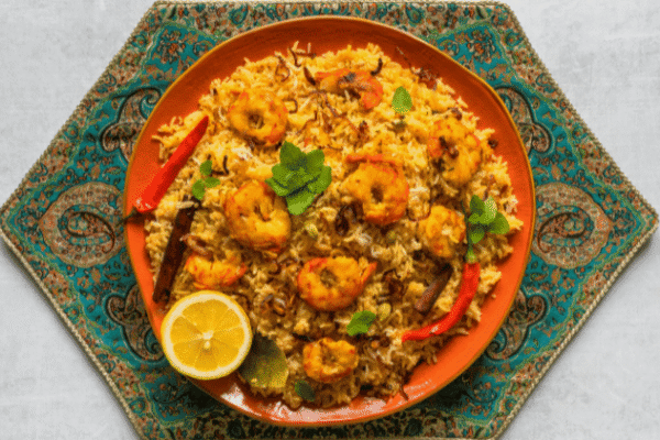 Prawn Biryani: Exploring the Aromatic Layers, Coastal Flavors, Spiced Prawns, Fragrant Basmati Rice, and Timeless Indian Culinary Traditions