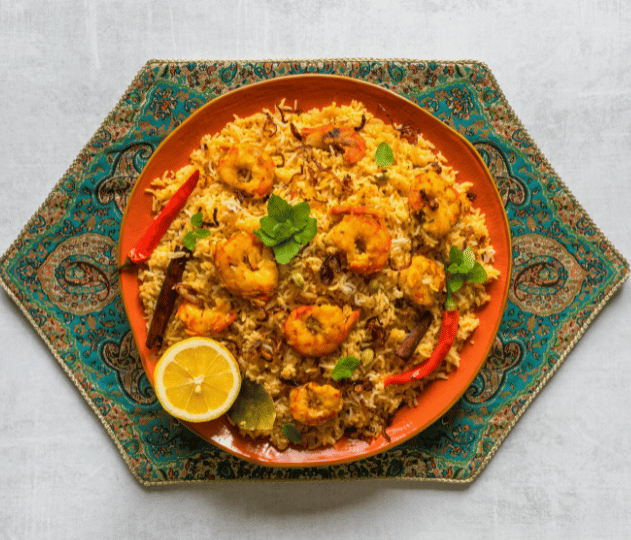 Prawn Biryani: Exploring the Aromatic Layers, Coastal Flavors, Spiced Prawns, Fragrant Basmati Rice, and Timeless Indian Culinary Traditions